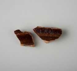 Manganese mottled holloware with cordons.