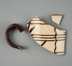 Astbury-type mug with handle.