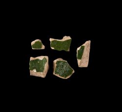 Green-glaze cream colored refined earthenware vessel, unid.