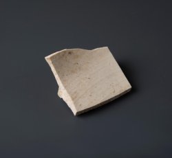 White salt glaze stoneware hollow vessel with footring.