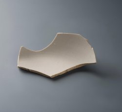 White salt glaze stoneware hollow vessel.