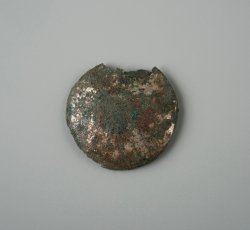 Coat button with Sheffield plate silver face.