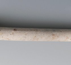 Tobacco pipe base and stem with molded &quot;W&quot; and &quot;M&quot; with crown on either side of heel.