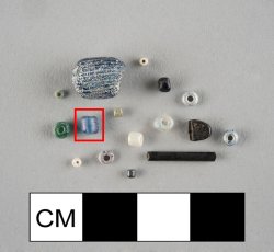 Drawn, simple, barrel-shaped blue seed bead