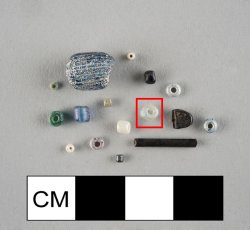 Drawn, simple, sub-spherical, clear seed bead