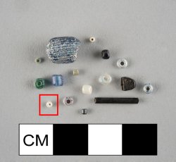   Drawn, simple, sub-spherical, white seed bead