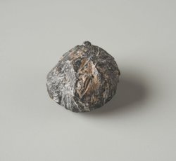 Possible large misshapen, cast lead shot 