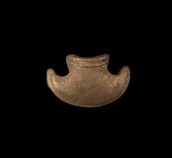 Copper alloy "axehead" horse strap keeper. 