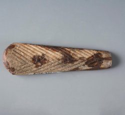 2-piece bone utensil handle with carved herringbone decoration