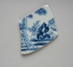 Chinese Export Porcelain flatware base with handpainted blue landscape scene. 