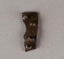 Copper alloy book clasp strap anchor plate.