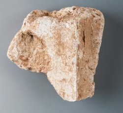 Plaster fragment from window or door jam.