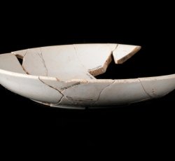 Ironstone/white granite saucer with maker's mark.