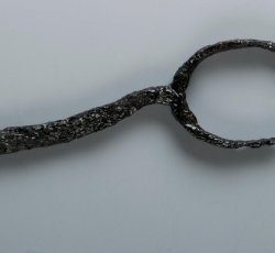 Iron scissors, bow and shank fragment.