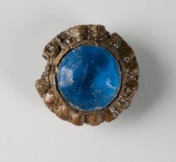 Faceted blue glass inset sleeve button.