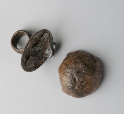 Two-piece domed button.