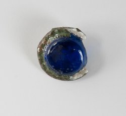 Blue glass inset sleeve button.