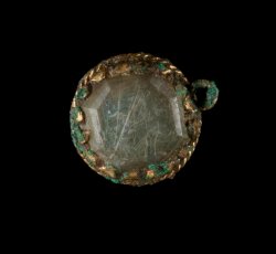 Colorless paste jewelry fragment.