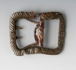 Shoe buckle with ornamental grooves and loop chape.