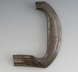 Shoe buckle frame with linear molded design.