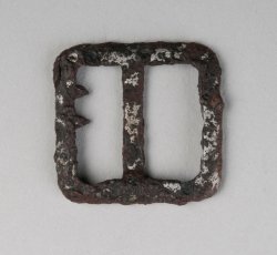 Square buckle with spiked frame.