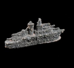 Die cast metal battleship monopoly game piece.