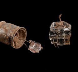 Camera flash bulb fragment.