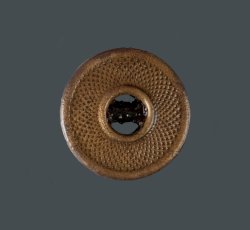 Copper alloy button with iron back.