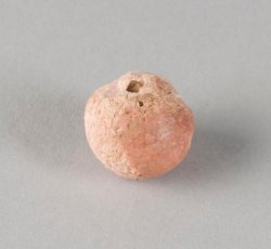 Large pink bead.