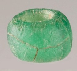 Drawn, simple, sub-spherical, green bead.