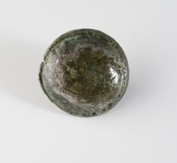 Plated copper alloy leather ornament.