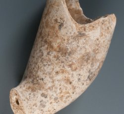 Tobacco pipe marked with ÒAÓ and ÒCÓ on either side of the heel along with a sunburst design. 