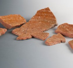 Post-medieval, London-area redware milk pan base.