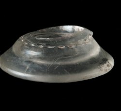 Glass candlestick base.