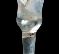 Wine glass with waisted bell bowl and partial stem.