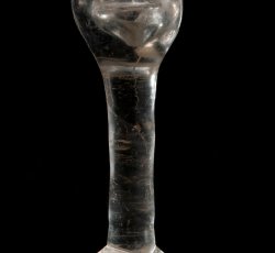 Wine glass with bowl base, stem, and partial foot.