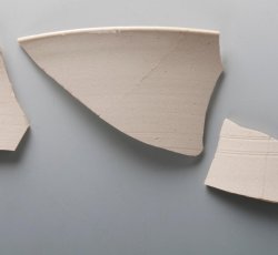 White salt-glazed stoneware hollowware.