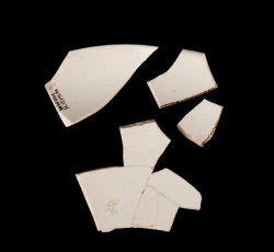 White salt-glazed stoneware saucer.