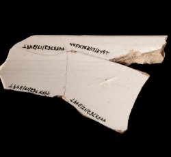White salt-glazed stoneware chamberpot.
