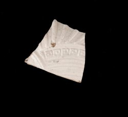 Slip-cast white salt-glazed stoneware possible teapot.