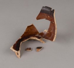 Manganese mottled drinking pot.