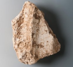 Plaster fragment from room corner.