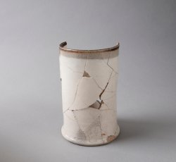 Slip-dipped stoneware mug.