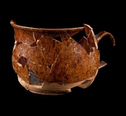 Manganese mottled drinking pot.