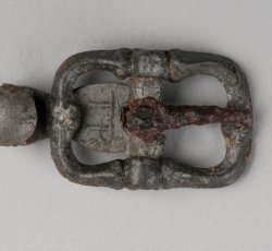 "TR"-marked pewter shoe buckle.