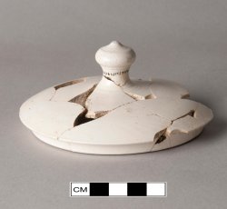 White salt-glazed stoneware coffee pot lid.