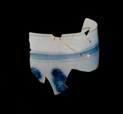 Debased, scratch blue, white salt-glazed stoneware mug.