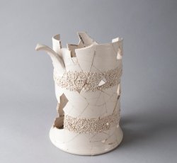 Large, rusticated white salt-glazed stoneware mug.
