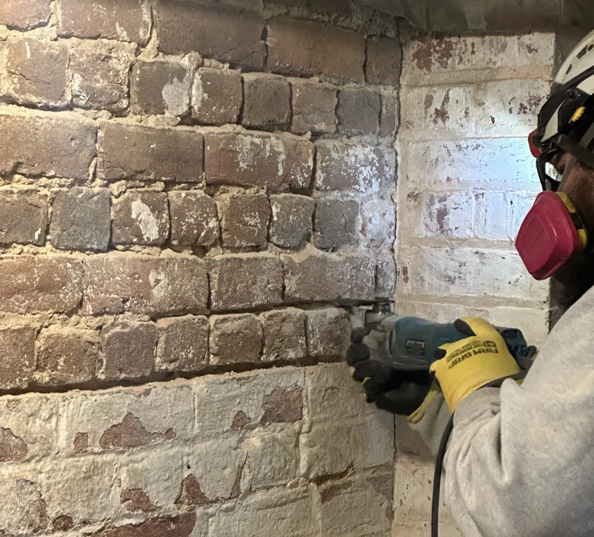 Masons remove concrete