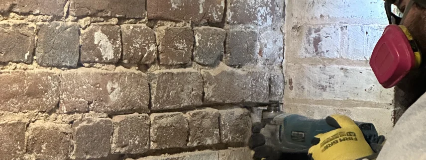 Masons remove concrete